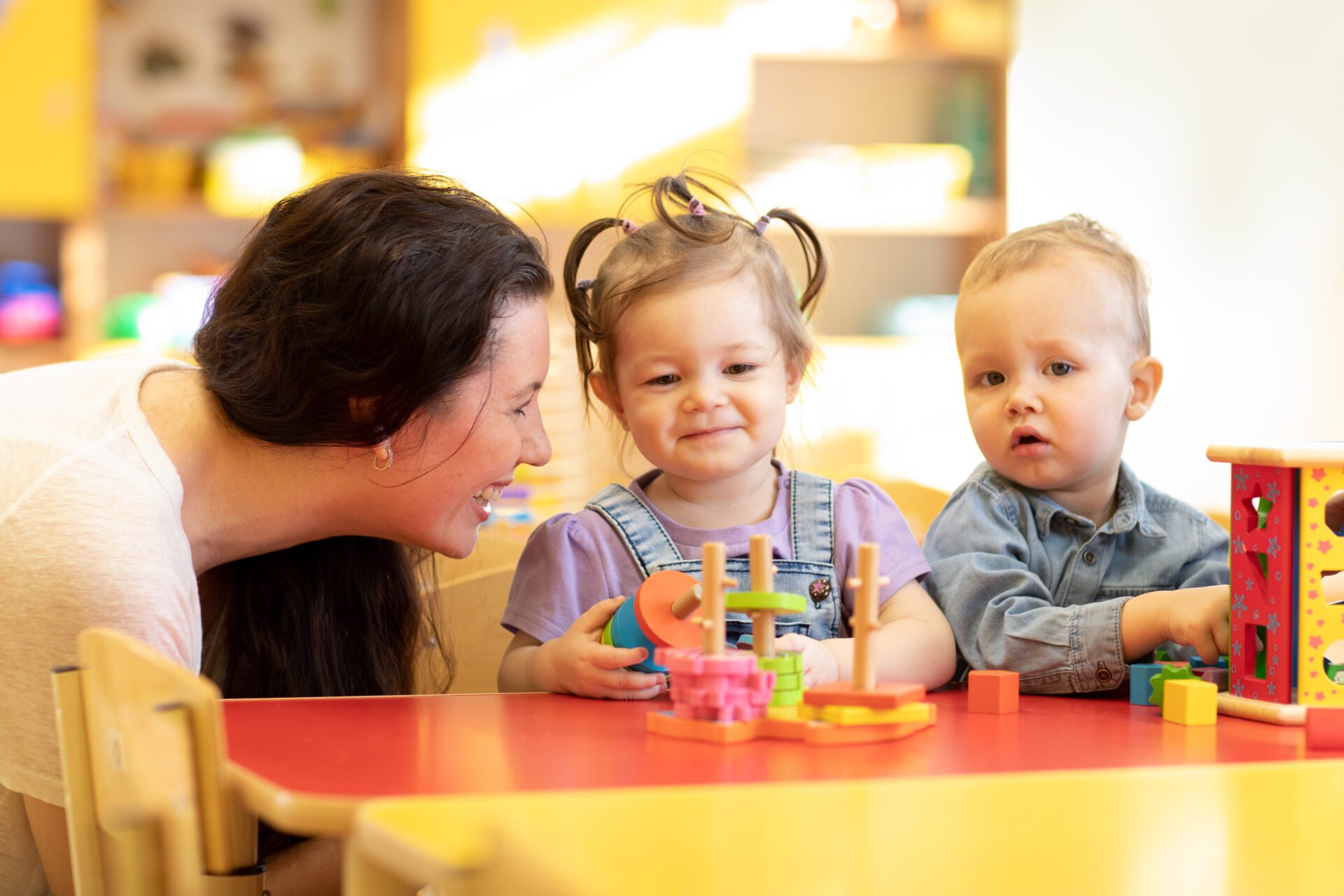 kids playing with puzzle, learning numbers and shapes